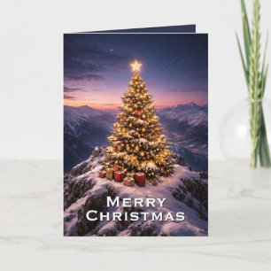 árbol de Navidad en la cima de una montaña persona