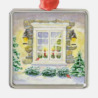 Árbol de Navidad en la ventana con ornamento de ca