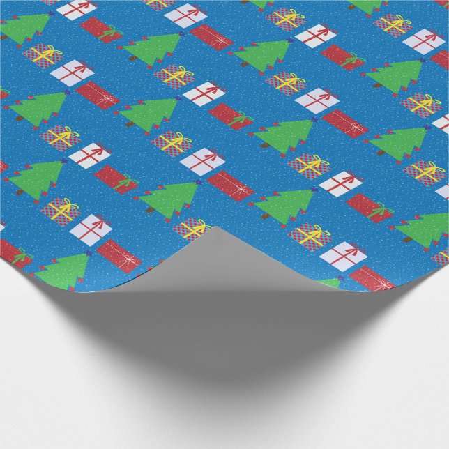 Árbol de Navidad y regalos sobre papel de envolver (Esquina)