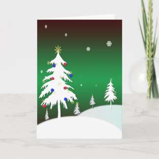 Árboles de navidad blancos con el fondo verde
