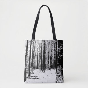 Árboles en la bolsa de asas de la nieve