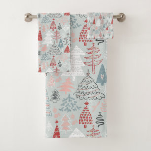 Árboles navideños deslumbrados por la mano rojo Sa