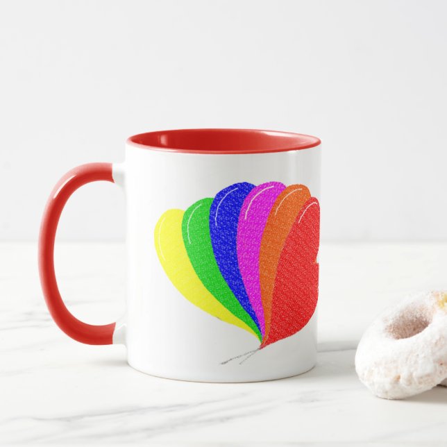 Arcoiris de los globos cardíacos en la taza del co (Con donut)