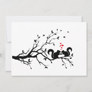 Ardillas con corazones rojos en rama de árbol