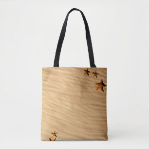 Arena y estrellas en una bolsa de tocado