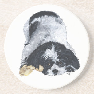 Arenisca Shih Tzu en negro y blanco sobre posavasos de aren
