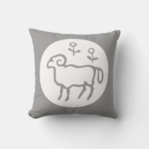 Aries astrología sobre almohada gris