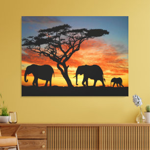 Arte de la silueta del elefante en la puesta de so
