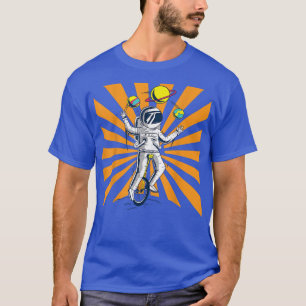Astronauta malabarista planetas monociclo camiseta