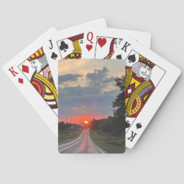 Atardecer en la carretera Jugando a las cartas