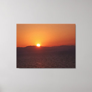 Atardecer, montaña y mar Impresión en lienzo
