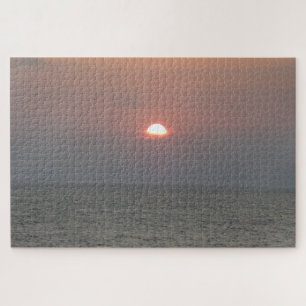 Atardecer sobre el rompecabezas del mar