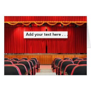 Auditorio con las cortinas y la bandera rojas