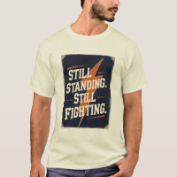 "Aún en pie. Seguimos luchando". Camiseta de MS
