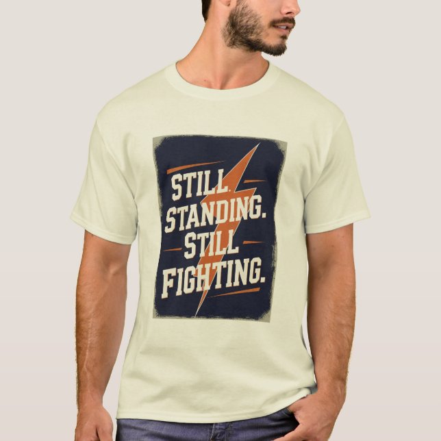 "Aún en pie. Seguimos luchando". Camiseta de MS (Anverso)