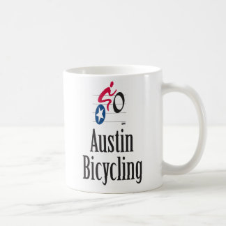 Austin que monta en bicicleta la taza