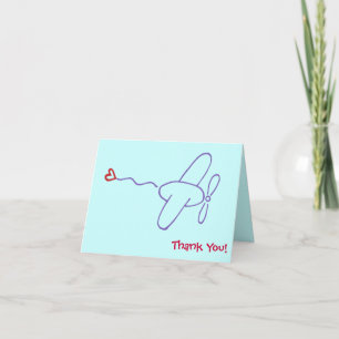 Avión con nota de agradecimiento de corazón