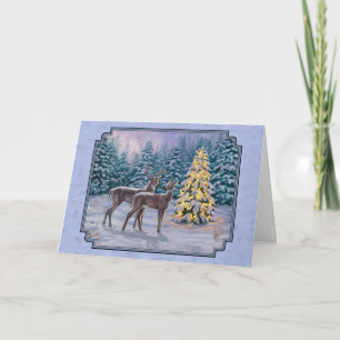 Azul invernal de ciervo y árbol de Navidad