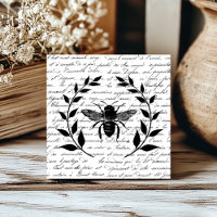 Abeja con corona de laurel y escritura francesa