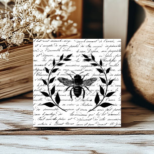Azulejo Abeja con corona de laurel y escritura francesa