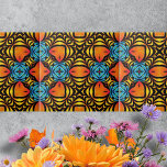 Azulejo Arreglos simétricos de color azul amarillo naranja<br><div class="desc">Este tilo de cerámica presenta un hermoso patrón que atrae la atención hacia un baile de color y forma. El diseño intrincado se caracteriza por arreglos simétricos de tonos vibrantes, creando un efecto de ilusión óptica. Las formas naranjas feroces, que se asemejan a ojos o hojas, son centrales en el...</div>