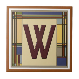 Azulejo Artes maravillosos y inicial geométrica W de los