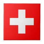 Azulejo Bandera de Suiza<br><div class="desc">La bandera suiza es una plaza con una cruz en el centro. Los colores usados en la bandera son rojo, blanco. La proporción de la bandera suiza es de 1:1. La bandera de Suiza se adoptó en 1889. El primer uso del diseño actual de la bandera fue en 1470. El...</div>