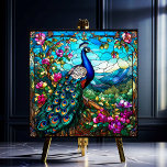 Azulejo Bonito Pavo Real Entre Jardín De Flores<br><div class="desc">El Hermoso Peacock Between Flower Garden presenta un pavo real colorido encaramado en un árbol con sus plumas de cola que caen sobre un fondo de follaje rico, colinas y flores florecientes, hecho con un efecto vidriera en una baldosa de cerámica. Hay muchos usos para estos maravillosos azulejos de cerámica....</div>