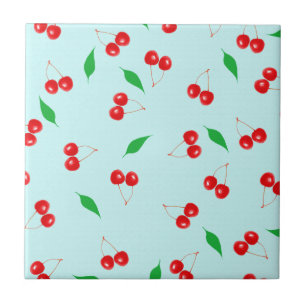 Azulejo Cerezas rosadas frescas en un fondo de la menta