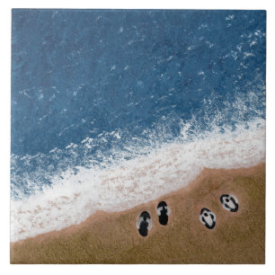 Azulejo Chanclas en la arena de la playa