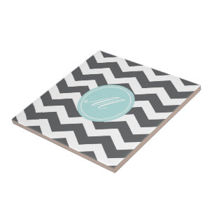 Azulejo Chevron gris con mosaicos monográficos