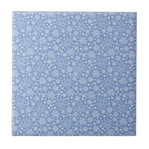 Azulejo Copos de Nieve de Doodle en un fondo azul