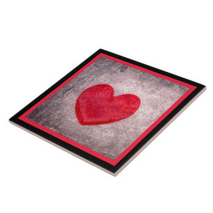 Azulejo Corazón encallado con manchas negras y rojas