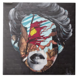 Azulejo Cubierta de graffiti que representa la cabeza de u