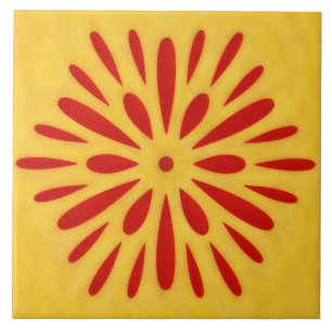 Azulejo de arte con símbolo de sol rojo y dorado