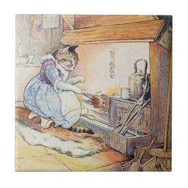 Azulejo De Cerámica El gato del gatito se sienta por el fuego