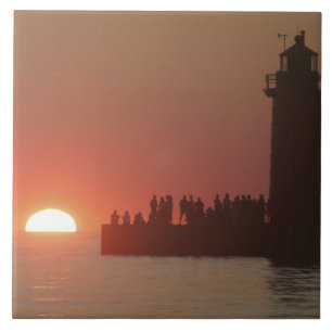 Azulejo De Cerámica Gente faro puesta de sol silueta en el sur