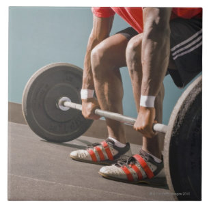 Azulejo De Cerámica Hombre afroamericano que resuelve el gimnasio