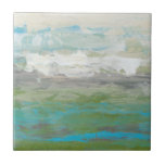 Azulejo De Cerámica Nubes blancas con vistas a un hermoso paisaje<br><div class="desc">Jennifer Goldberger pintó este hermoso paisaje. Las nubes blancas dan a un impresionante lago azul rodeado de un precioso césped verde. Los colores son vivos y los detalles están impecables. ¡Compra tu impresión ahora!</div>