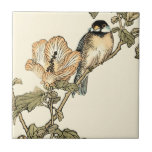 Azulejo De Cerámica Pájaro oriental encaramado en rama<br><div class="desc">Esta imagen de arte muestra una imagen nítida y vívida de un ave oriental encaramada en una rama. Debajo hay una flor naranja con un alto grado de precisión de color. Esta fina estampada contemporánea de arte de inspiración oriental le dará carácter a cualquier pared de su casa.</div>