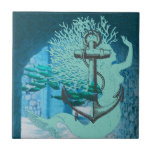 Azulejo De Cerámica Sirena y ancla<br><div class="desc">Una sirena explora las ruinas submarinas. Un ancla flota como si no tuviera gravedad,  y un colegio de peces la sigue. Fantasía de sirena.</div>