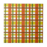 Azulejo De Cerámica Tela escocesa retra del amarillo anaranjado 70s<br><div class="desc">Este diseño enrrollado, original de la teja 70s-inspired se hace para parecer los años 70 maravillosos o la tela escocesa del vintage del finales de los sesenta en sombras del naranja, del amarillo del oro, del verde de musgo y de rojo marrón en blanco. El modelo a cuadros inconsútil se...</div>