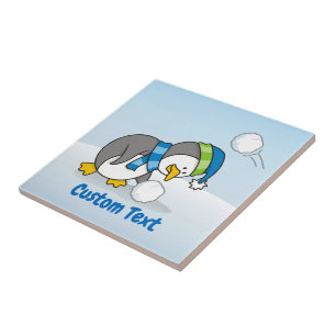 Azulejo De Cerámica Un pingüino con una bola de nieve