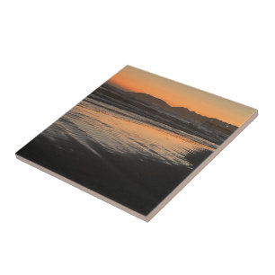 Azulejo Desde el anochecer hasta el crepúsculo en la playa