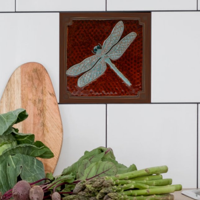 Azulejo Dragonfly Tile, marrón y turquesa (Brown and turquoise dragonfly tile shown in a kitchen with  white tiles.)