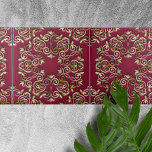 Azulejo Elegantes Rosas doradas y curvas en rojo borgoñoso<br><div class="desc">Esta baldosa cerámica presenta un diseño intrincado de elegantes torres dorados y curvas que se entrelazan con un rico fondo burdeos. El patrón simétrico exuda una sensación de lujo y sofisticación. La combinación del cálido color burdeos con los detalles dorados ornamentados crea una estética de lo más normal, haciendo de...</div>