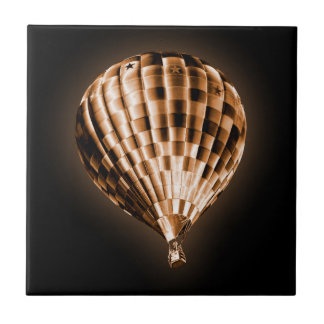 Azulejo Globo de aire caliente de oro brillante en negro