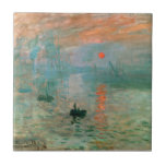 Azulejo Impresión, amanecer de Claude Monet<br><div class="desc">Esta famosa pintura muestra el sol en la niebla y algunos montones de botes pegados en primer plano. El paisaje no es más que una impresión, y una instantánea. Claude Monet Claude Monet fue fundador de la pintura impresionista francesa. El término Impresionismo se deriva del título de su pintura "Impresión,...</div>