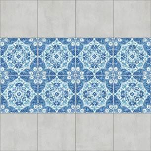 Azulejo intrincado azul y blanco con motivo floral