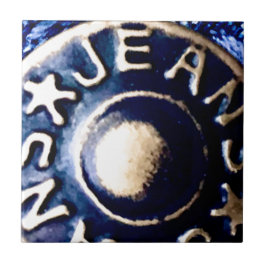 Azulejo Macro acercamiento de un botón de jeans de bronce